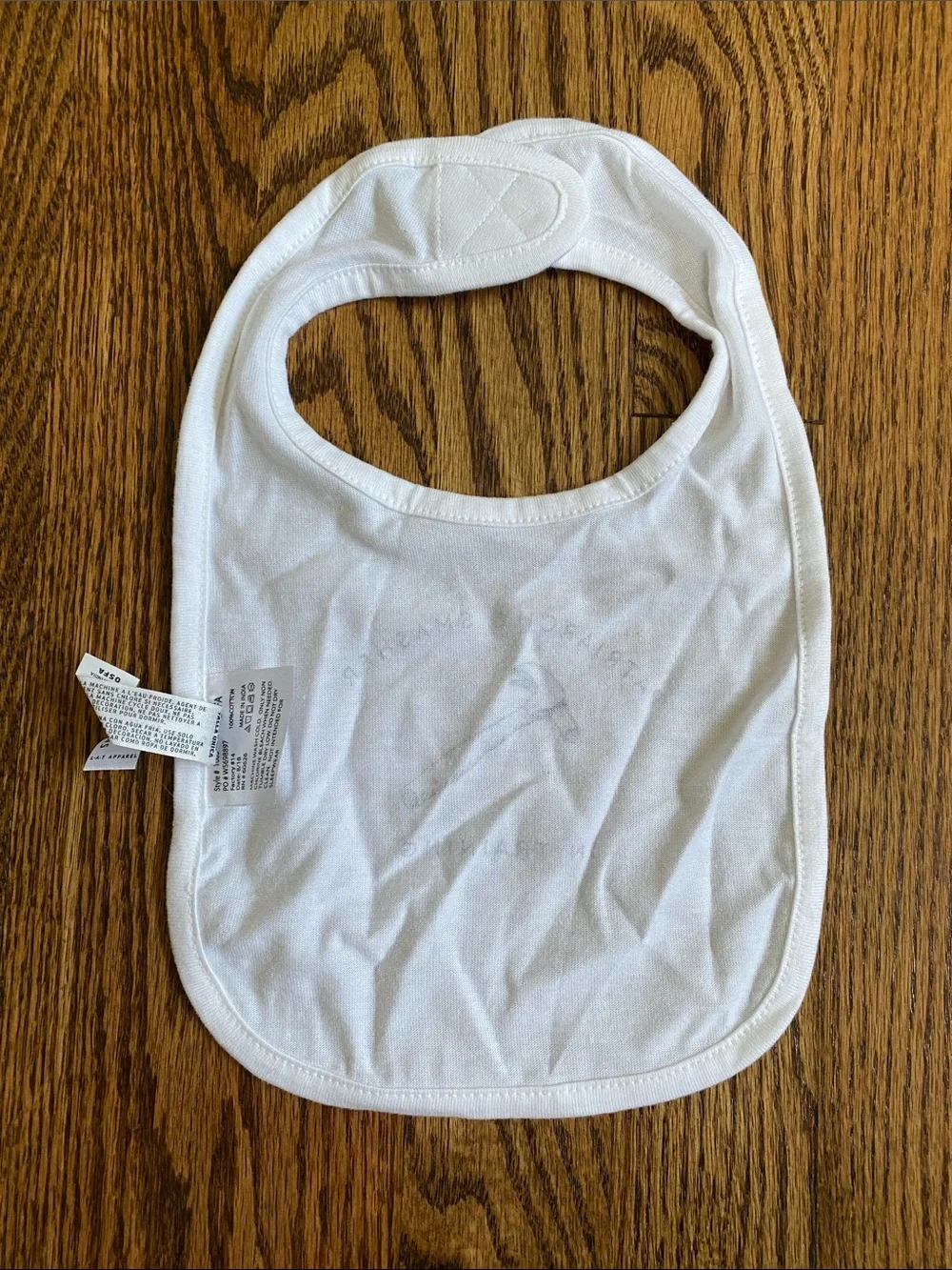Rabbit Skins White Baby Bib with 'Patriarchy Smasher' Hammer Graphic, like new.